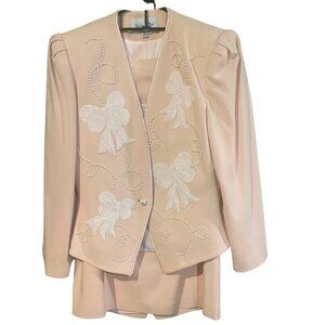 Elegant Peach Blazer and Skirt Set with Bow Details